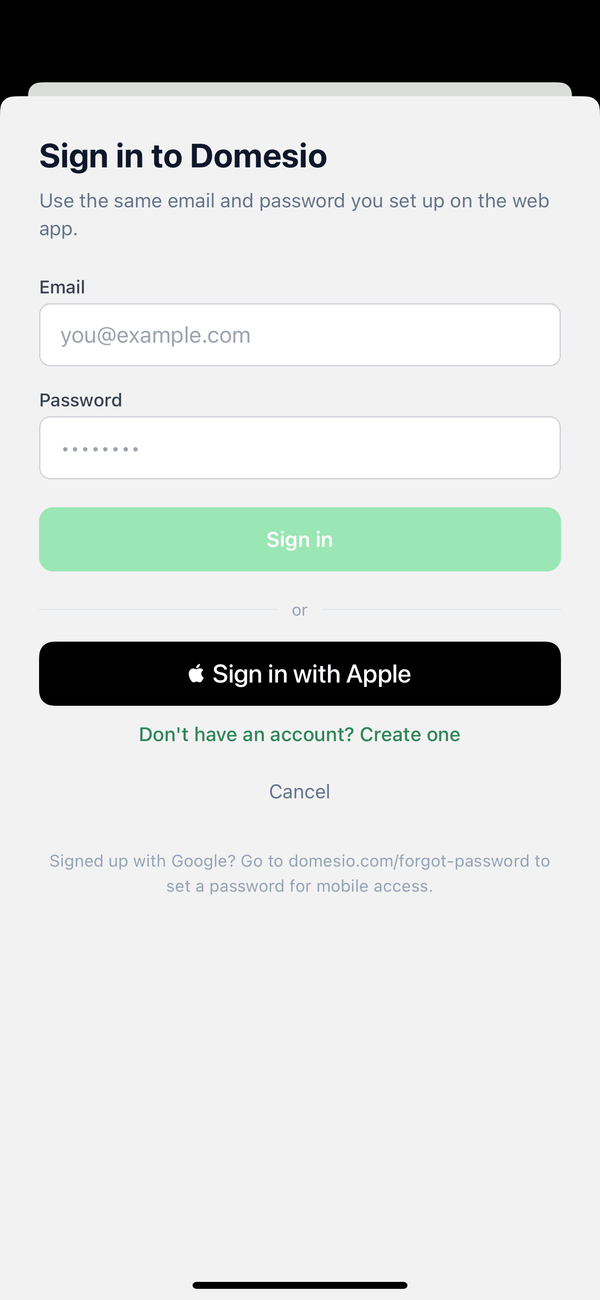 The Sign in to Domesio screen with email, password, and Sign in with Apple
